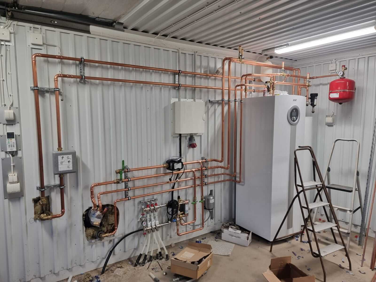 Copper piping system and heat pump in technical room
